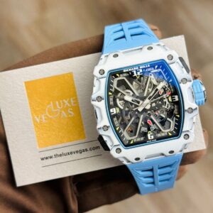 Richard Mille white carbon fiber sports watch—skeletonized dial and blue rubber strap
